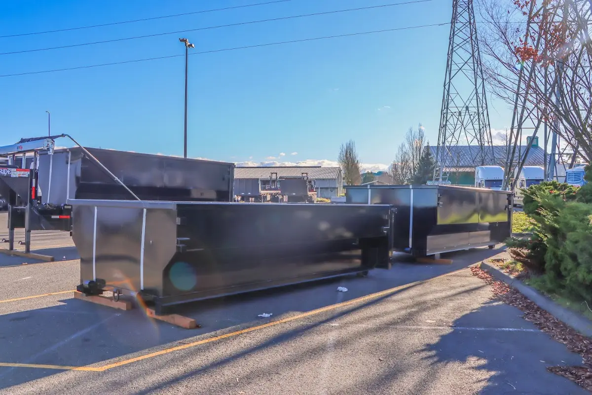 Roll-off dumpster ready for waste disposal at job site for Concrete Dumpster Rental in Pleasanton